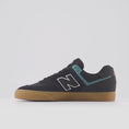 Load and play video in Gallery viewer, New Balance 574 Shoes Black / Vintage Teal
