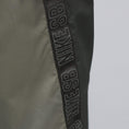 Load image into Gallery viewer, Nike SB Ishod Track Pant Orange Label Sequoia / Olive