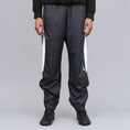 Load image into Gallery viewer, Nike SB Shield Swoosh Skate Tracksuit Pant Black / White / White