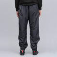 Load image into Gallery viewer, Nike SB Shield Swoosh Skate Tracksuit Pant Black / White / White