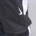 Load image into Gallery viewer, Nike SB Shield Swoosh Skate Tracksuit Pant Black / White / White