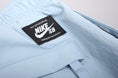 Load image into Gallery viewer, Nike SB Swoosh Track Pants Light Armory Blue / Obsidian / Obsidian