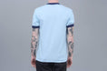 Load image into Gallery viewer, Passport Icy Hot Ringer T-Shirt Powder Blue / Navy
