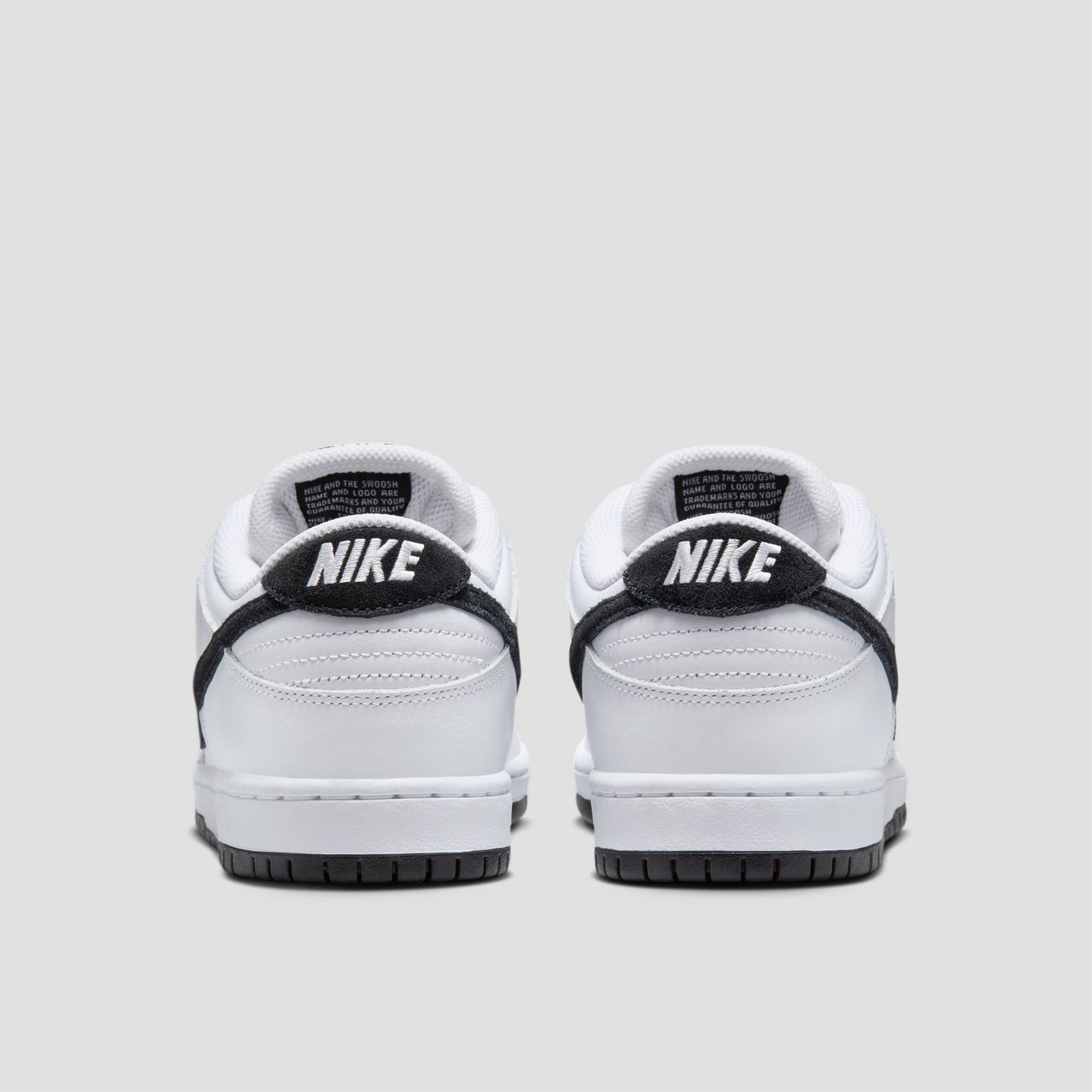 white and black nike dunks low