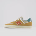 Load and play video in Gallery viewer, New Balance 574 Shoes Tan / Teal
