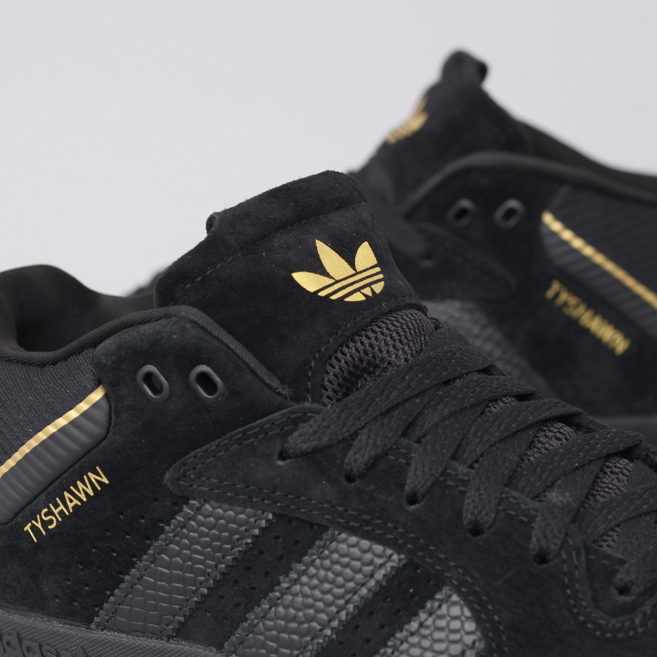adidas Tyshawn Shoes Core Black / Core Black / Gold Metallic adidas Tyshawn Shoes Core Black / Core Black / Gold Metallic