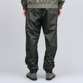 Load image into Gallery viewer, Nike SB Ishod Track Pant Orange Label Sequoia / Olive
