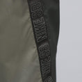Load image into Gallery viewer, Nike SB Ishod Track Pant Orange Label Sequoia / Olive
