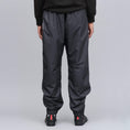 Load image into Gallery viewer, Nike SB Shield Swoosh Skate Tracksuit Pant Black / White / White
