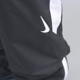 Load image into Gallery viewer, Nike SB Shield Swoosh Skate Tracksuit Pant Black / White / White
