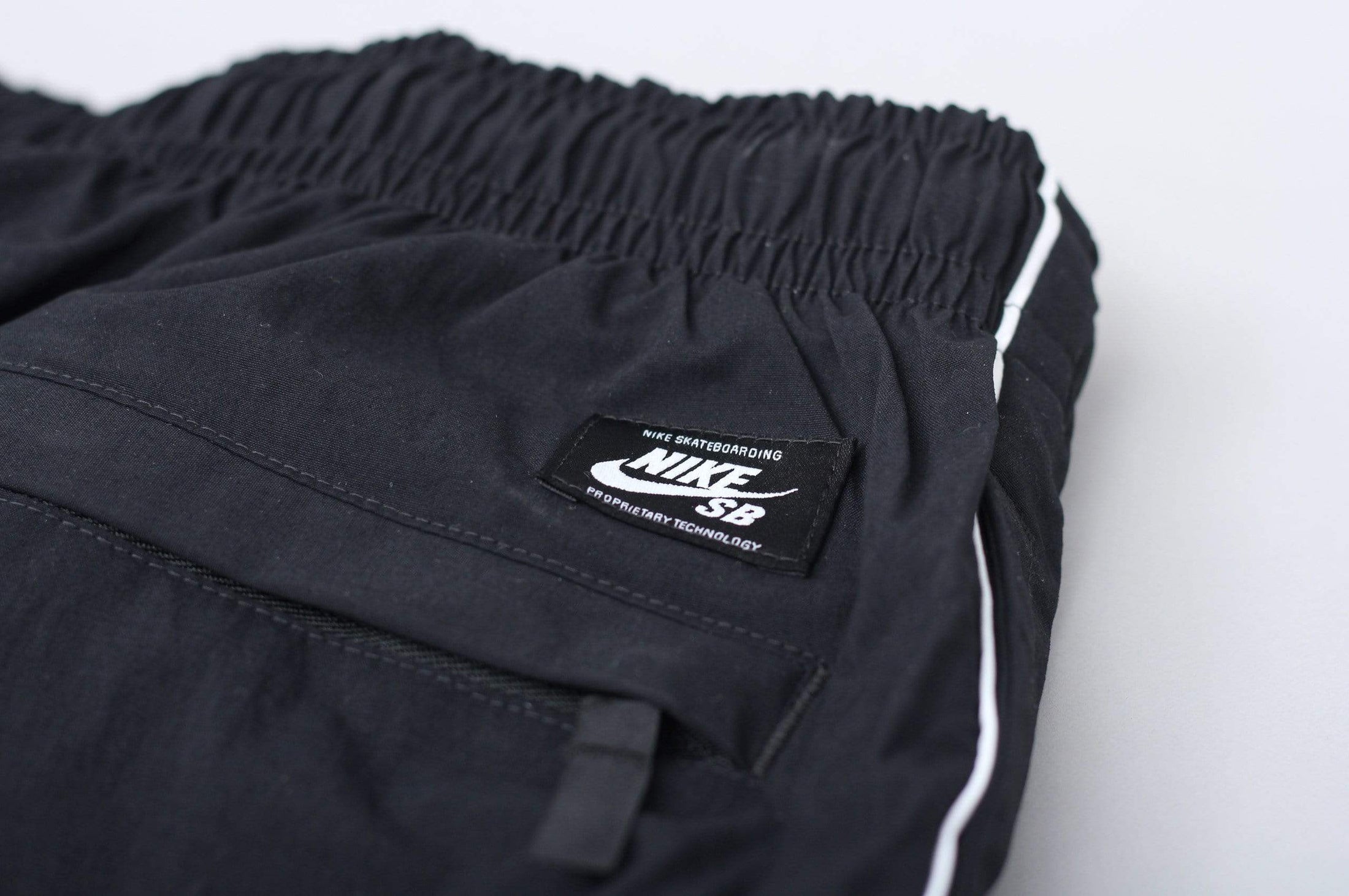 Nike SB Swoosh Track Pants Black / White